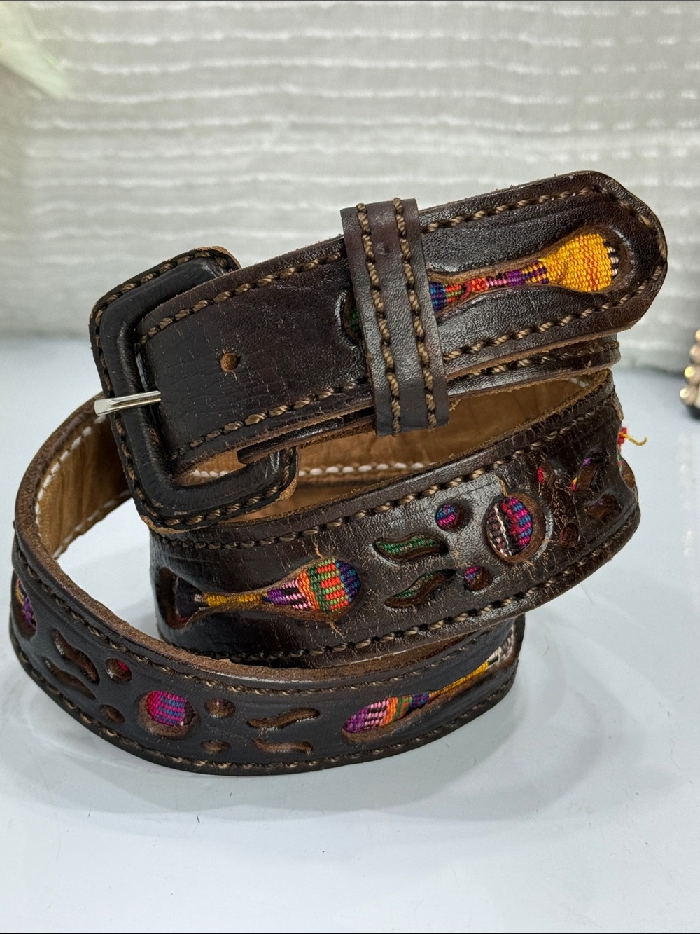 (H) Handmade openwork leather belt with Aztec designs and tapestry fabric,Sz 38